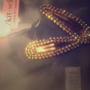 Kitsch rhinestone hair clips. Yellow gold tone.